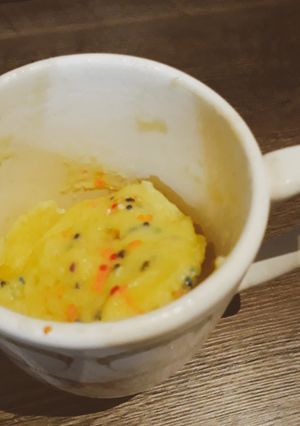 Una foto de Pastel de naranja en taza
