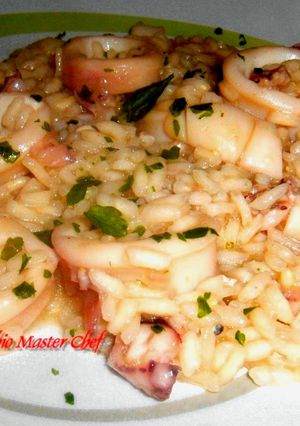 A picture of Risotto with Calamari and Prosecco.