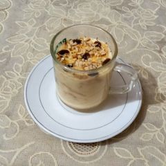 A picture of Vanilla custard with tuc and nuts🍝🥜🍝.