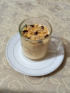 A picture of Vanilla custard with tuc and nuts🍝🥜🍝.