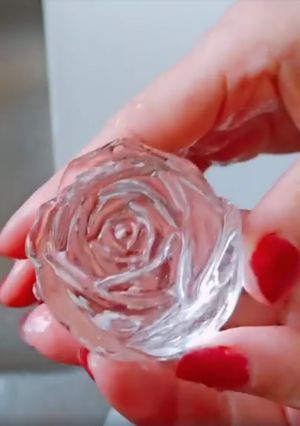 A picture of How to make crystal clear ice with rose shape, round or any shapes!.