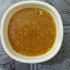 A picture of Tomato coriander rasam.