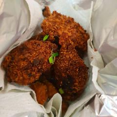 A picture of Krispy fried chicken thighs.