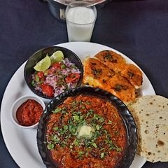 A picture of Pav Bhaji In Cooker.