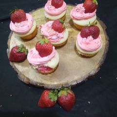 A picture of Vanilla strawberry cup cakes.