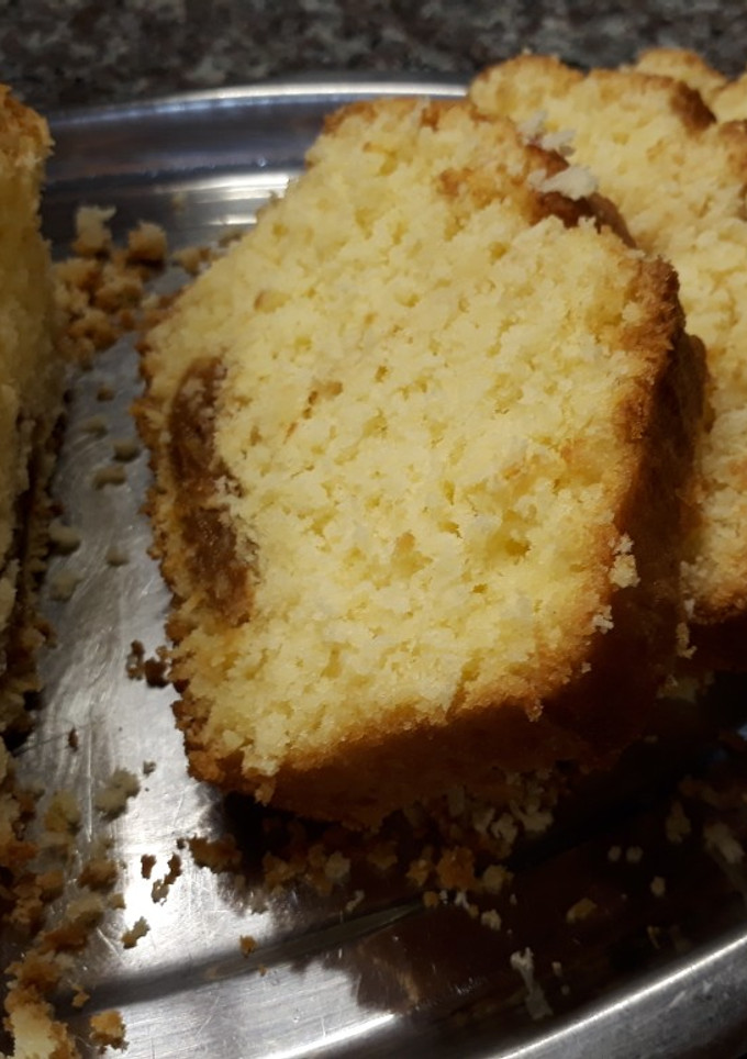 Una foto de Budín de coco y dulce de leche