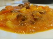 Una foto de carne a la sidra