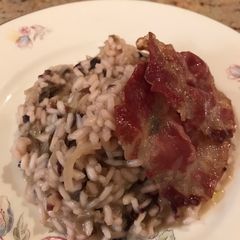 A picture of Risotto with radicchio and crispy coppa.