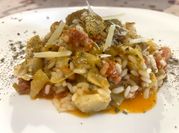 Una foto di carciofo salsiccia