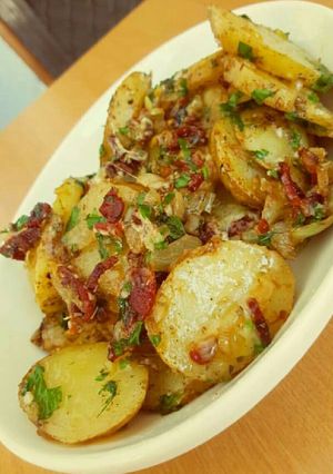 A picture of Potatoes Bacon and Cheese.