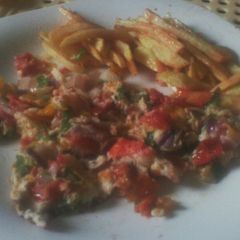 A picture of Fries and Spanish omelette.