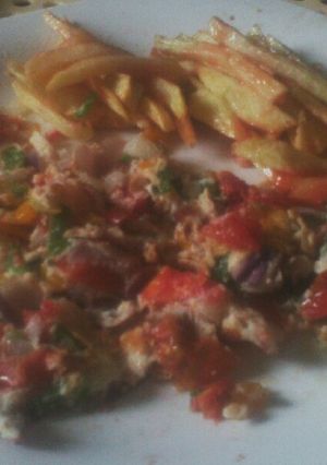 A picture of Fries and Spanish omelette.