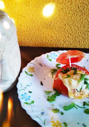 A picture of Poached egg in a tomato (🍅)cup.