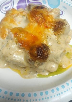 A picture of Alfredo Meatball Lasagna with Pesto.