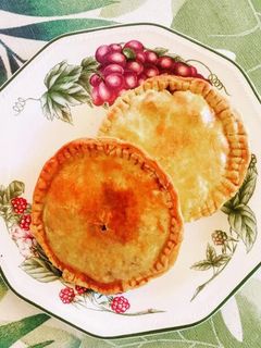 Una foto de Pastelitos rellenos de pollo y champiñones
