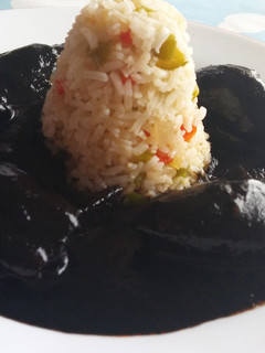 Una foto de Chipirones rellenos en su tinta