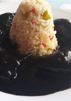 Una foto de Chipirones rellenos en su tinta