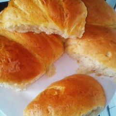 A picture of Mini buns using charcoal jiko.