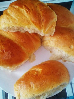A picture of Mini buns using charcoal jiko.