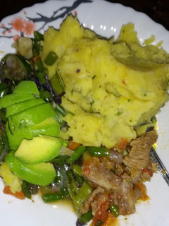 A picture of Maizeless mukimo served with goat meat n veges.
