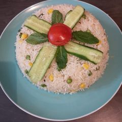 A picture of Matar and corns pulao.