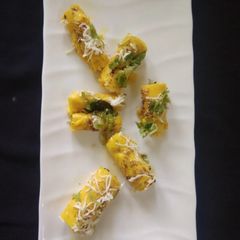 A picture of Paneer Khandvi.