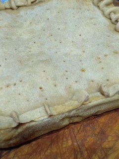 Una foto de Empanada Gallega 🇪🇸