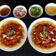 A picture of Banarasi Tamatar Chat.