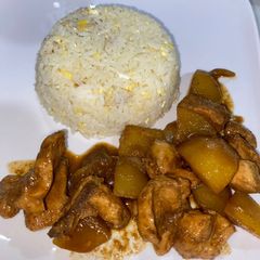A picture of Sweet soy sauce chicken with fried rice.