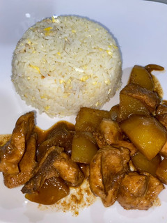 A picture of Sweet soy sauce chicken with fried rice.