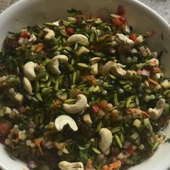 A picture of Sweet and Tangy Couscous salad with nuts and vegetables.