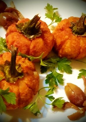A picture of Potato croquettes stuffed with cheese and pumpkin seeds.