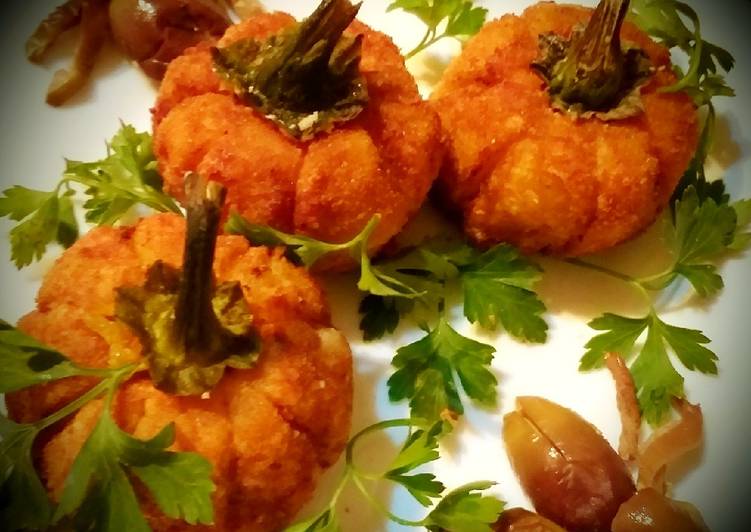 Potato croquettes stuffed with cheese and pumpkin seeds