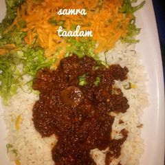 A picture of Rice,stew,lettuce and carrot.
