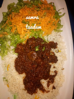 A picture of Rice,stew,lettuce and carrot.