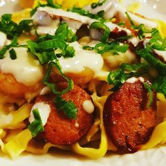 A picture of Cajun shrimp and sausage alfredo.