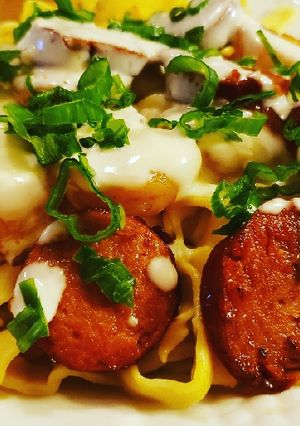 A picture of Cajun shrimp and sausage alfredo.