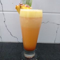 A picture of Pineapple Sherbet Coconut Cocktail.