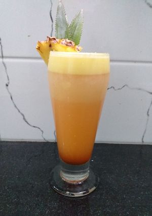 A picture of Pineapple Sherbet Coconut Cocktail.