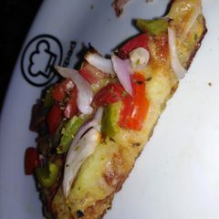 A picture of Potato crust veg pizza.
