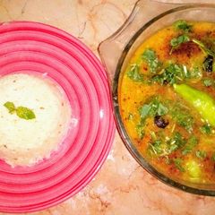 A picture of Masoor daal with zeera rice.