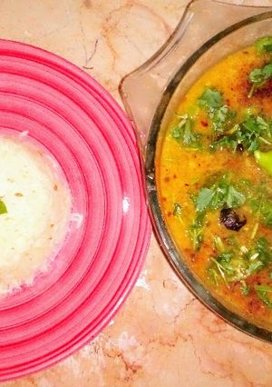 A picture of Masoor daal with zeera rice.