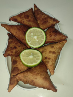 A picture of Ndengu (green grams) & butternut Samosa.