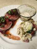Brad's bacon wrapped venison loin chops with port wine au jus and cucumber salad