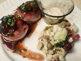 Brad's bacon wrapped venison loin chops with port wine au jus and cucumber salad