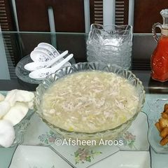A picture of Chicken Corn Soup with Croutons and Fish crackers.