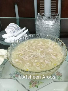 A picture of Chicken Corn Soup with Croutons and Fish crackers.