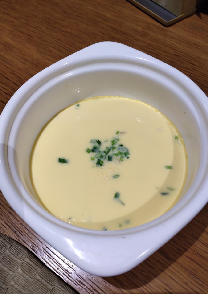 A picture of Steam Egg with Ham and Spring Onion.