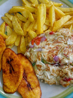 A picture of Chips, fried plantain & fried eggs.