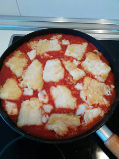 Una foto de Bacalao con tomate